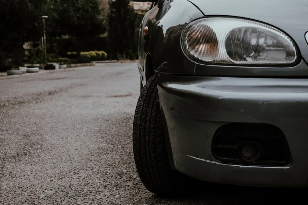 A car parked on the side of a road A car parked on the side of a road