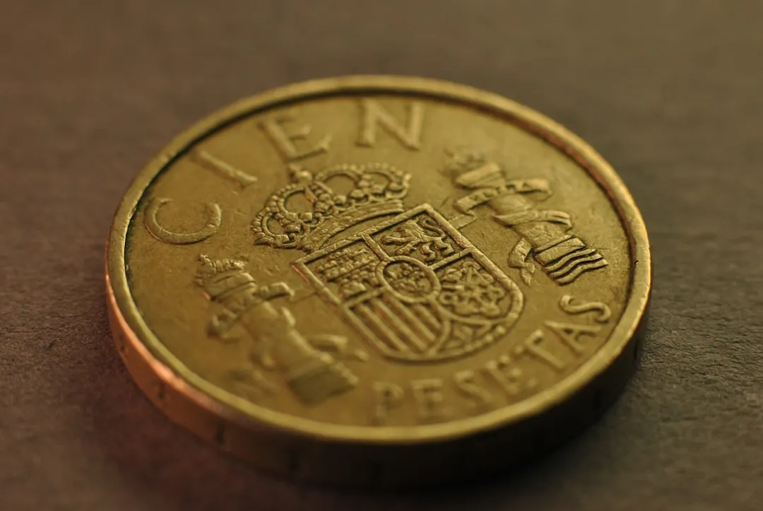 A close-up of a coin on a table