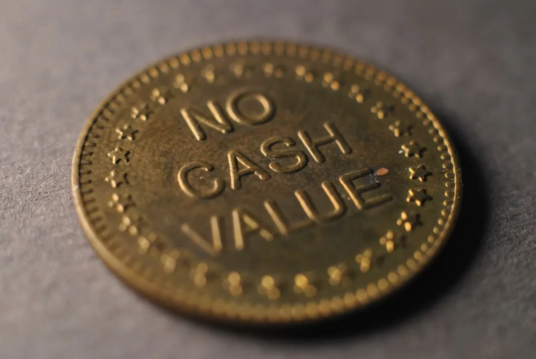 A close-up of a coin on a table