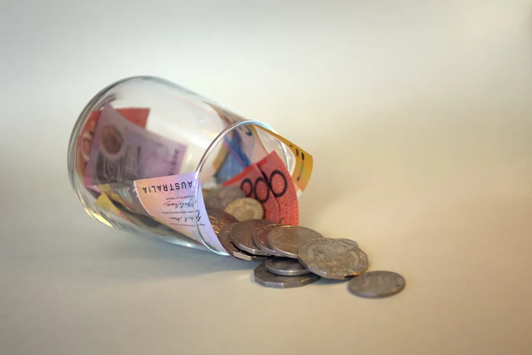 Coins in a clear glass jar