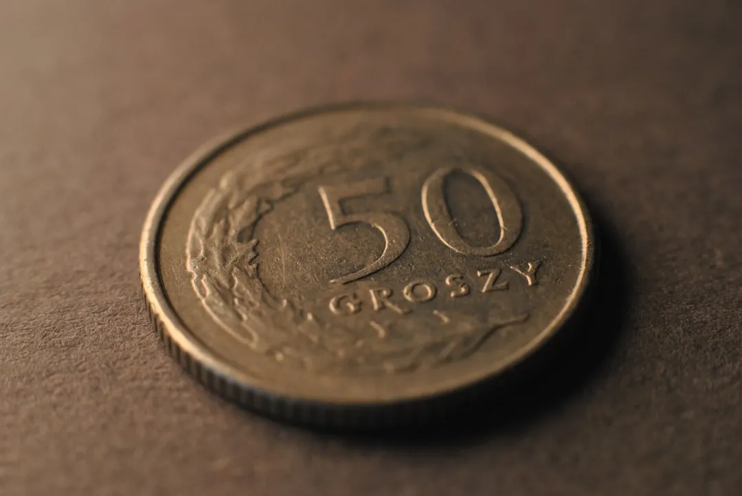 A close-up of a coin on a table
