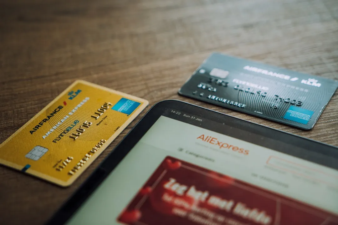 Visa card on a brown wooden table Visa card on a brown wooden table