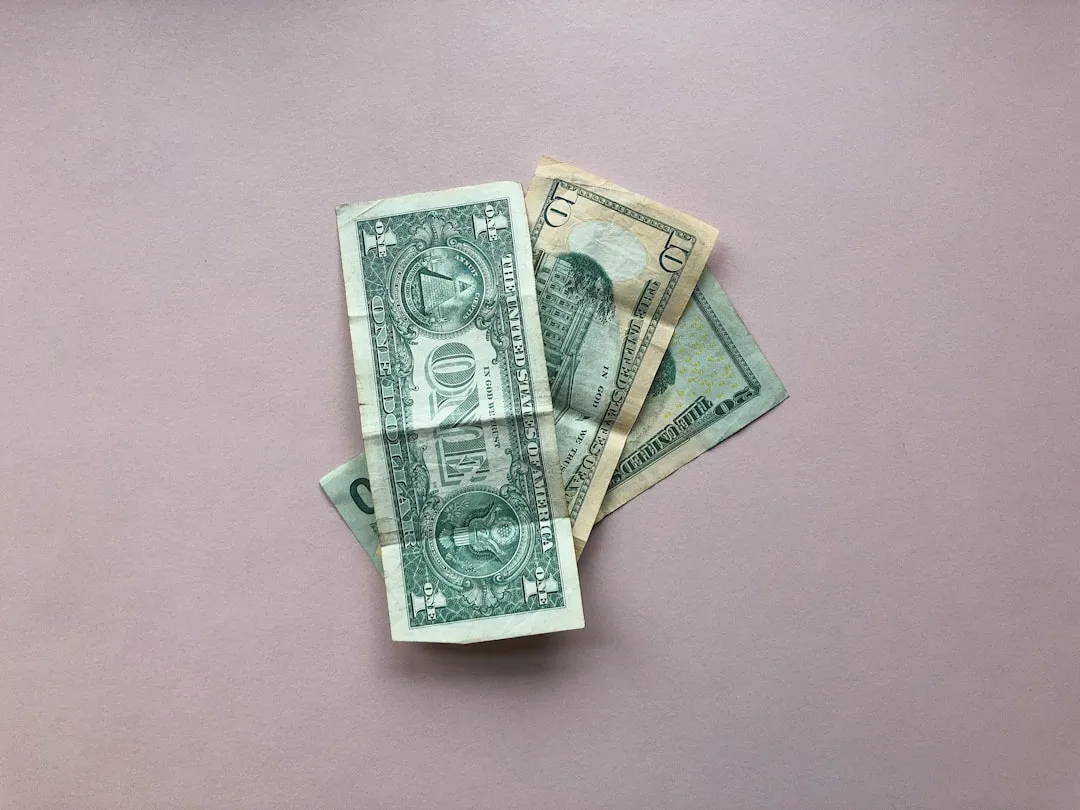 Three US dollar banknotes Three US dollar banknotes